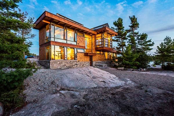 Post and beam cottage on a rocky outcropping off Georgian Bay