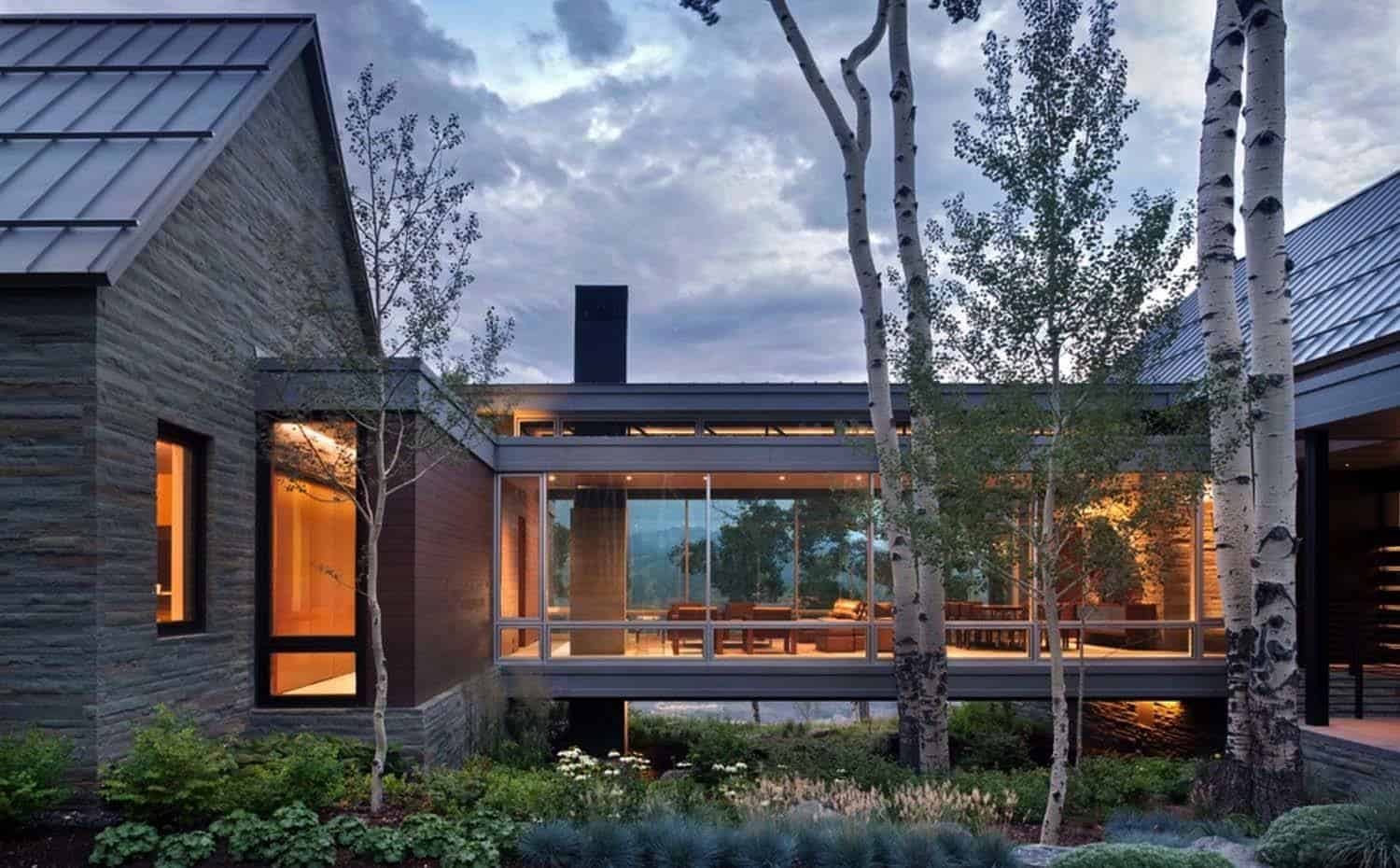Sleek, contemporary dwelling in Colorado features a glass bridge