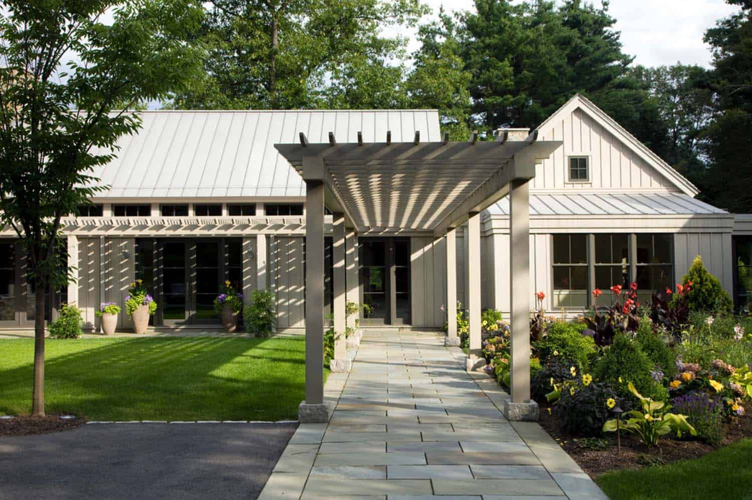 A suburban garden retreat with elegant interiors in Massachusetts