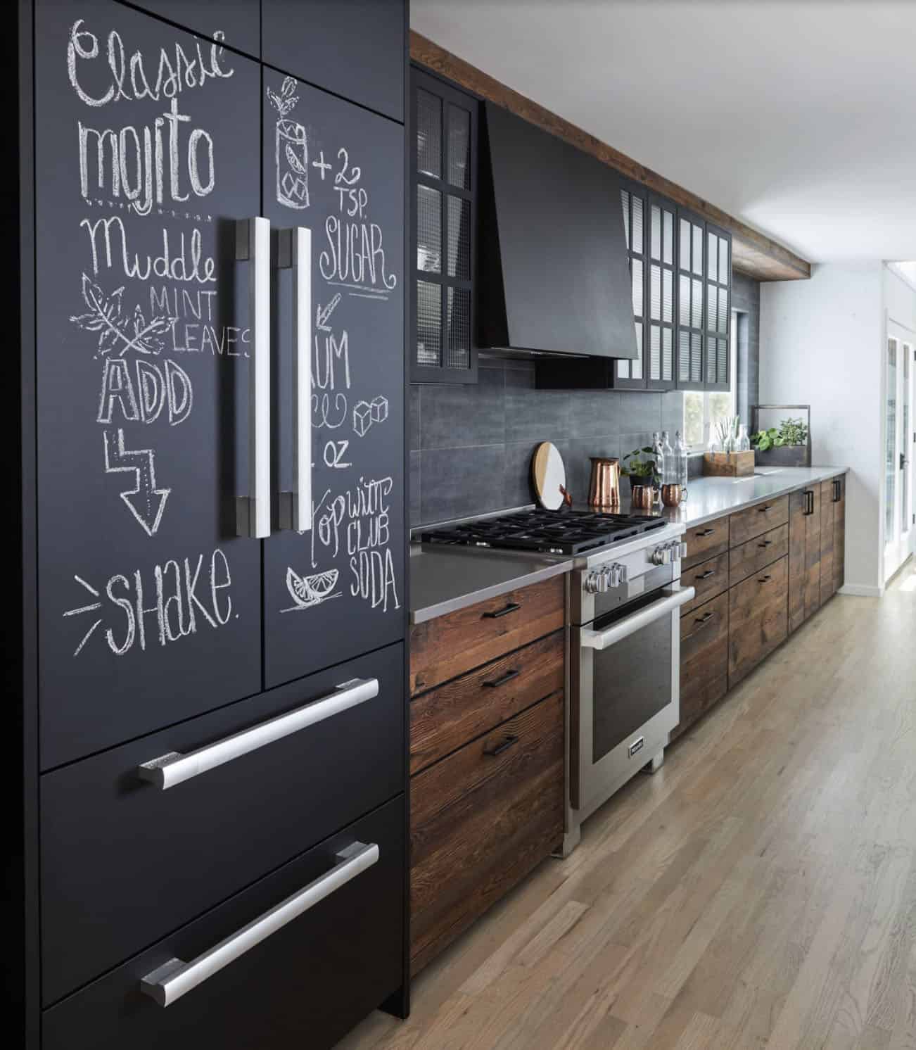 modern farmhouse style kitchen with barn wood and black chalk paint