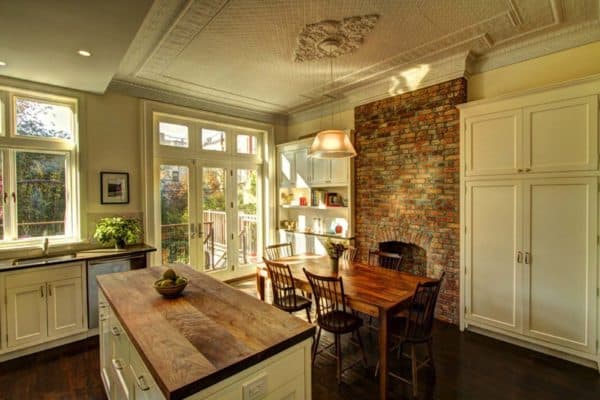 25 Fabulous Kitchens Showcasing Warm And Cozy Fireplaces