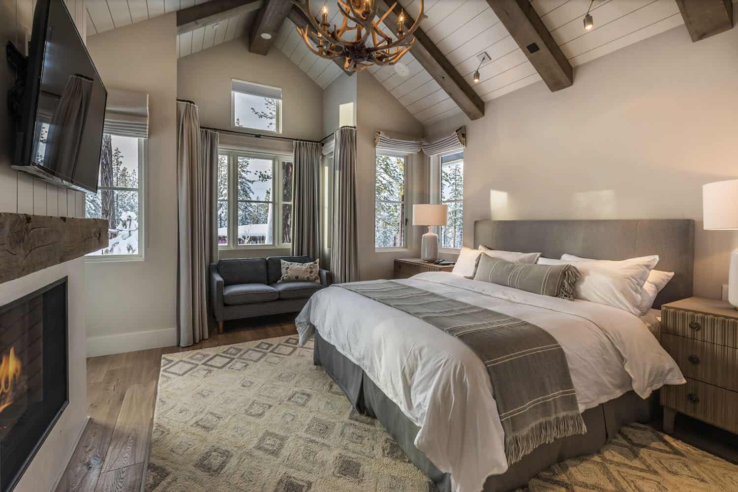 rustic bedroom with vaulted ceilings