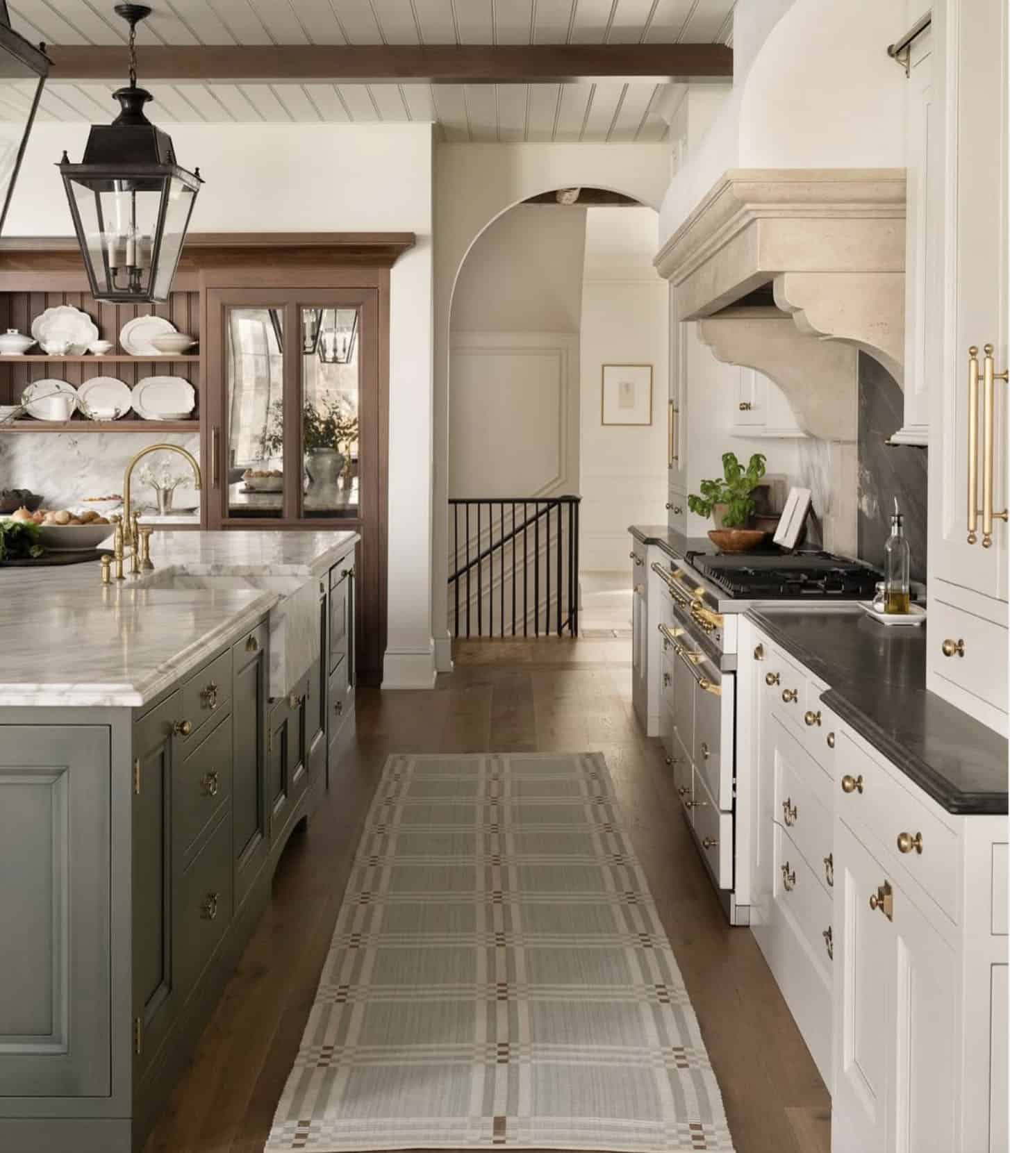transitional style kitchen with large pendant lights