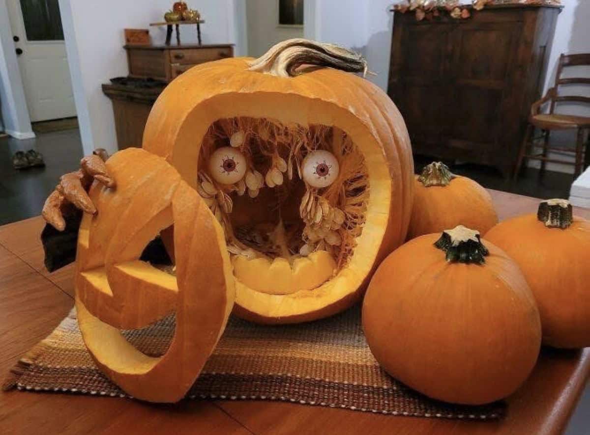 pumpkin holding its carved off face