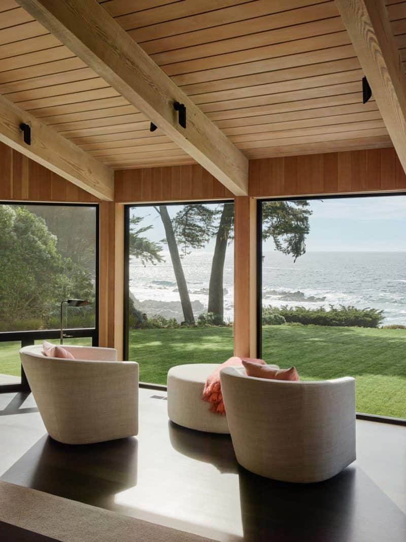 Sea Ranch retreat perched on a jagged cliff with sweeping Pacific Ocean ...