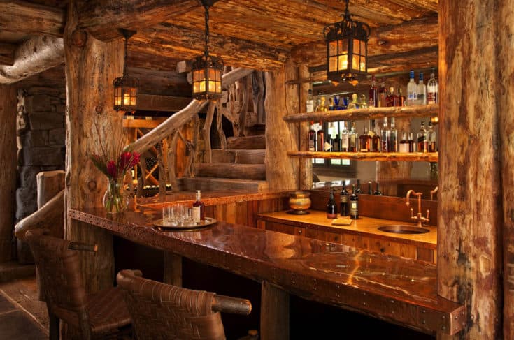 Step into this dreamy Big Sky mountain cabin with rustic luxe interiors