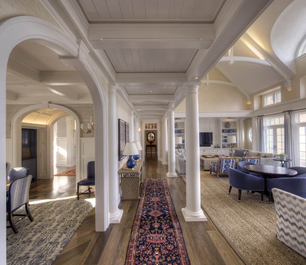 Step into this shingle-style home perched on the serene shores of Lake ...