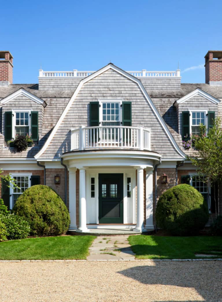 This Martha's Vineyard shingle style home has water views from every room