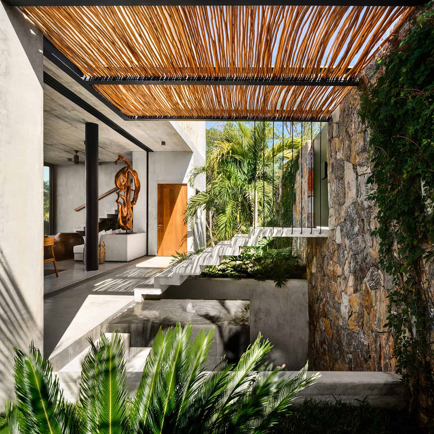 tropical-minimalist-holiday-home-entry-staircase