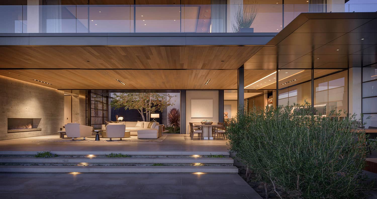 contemporary-coastal-home-exterior-evening-entertaining