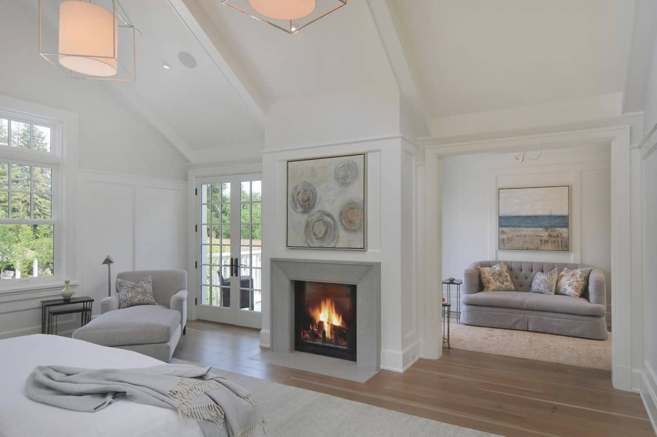 modern-farmhouse-bedroom-with-a-fireplace