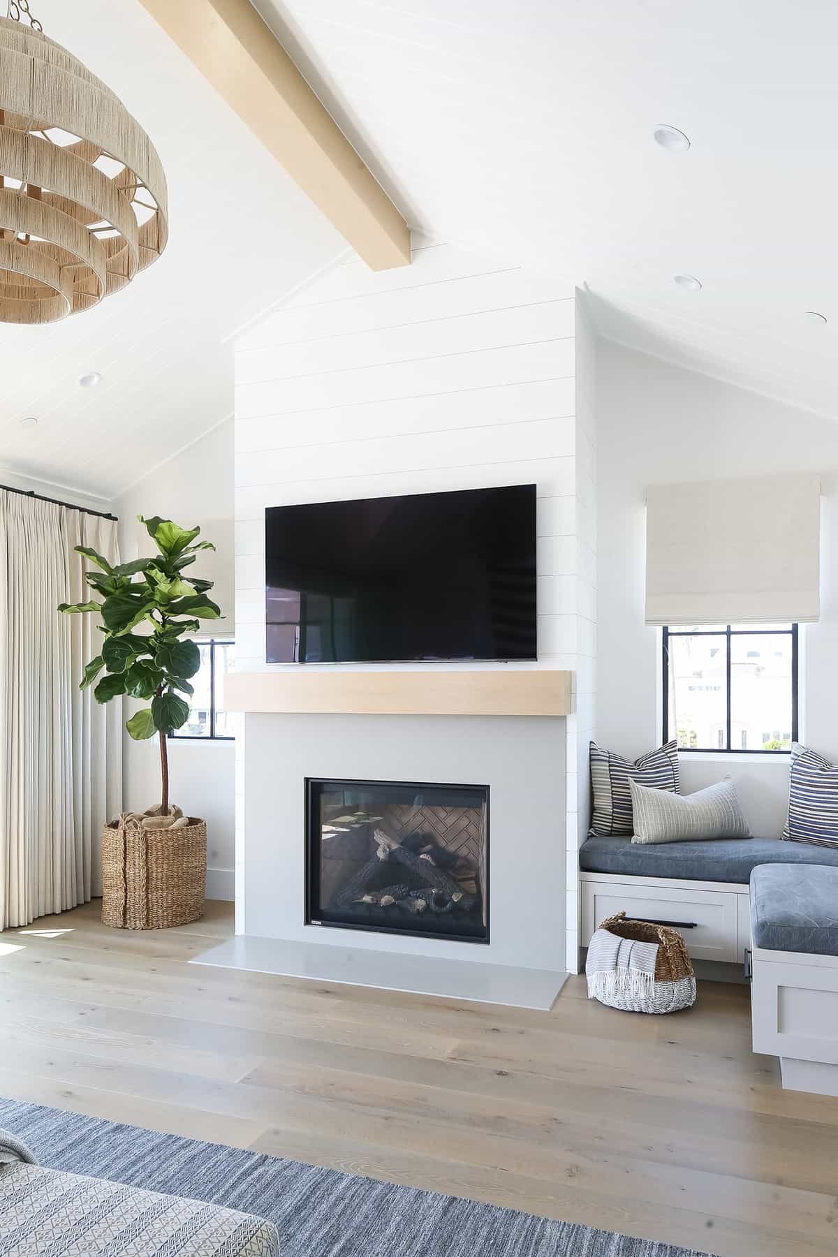 beach-style-bedroom-fireplace