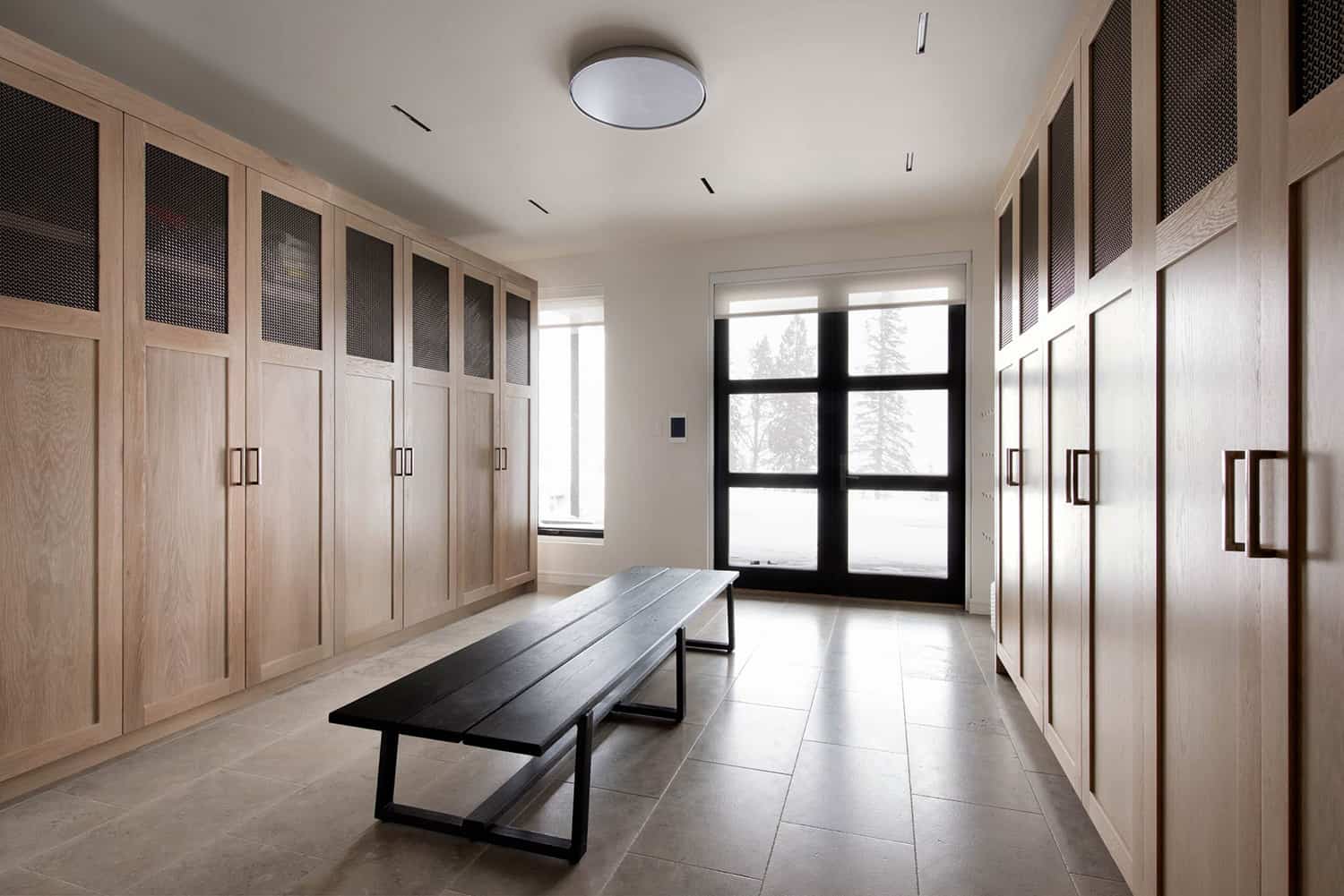 luxury-mountain-style-mudroom-ski-storage