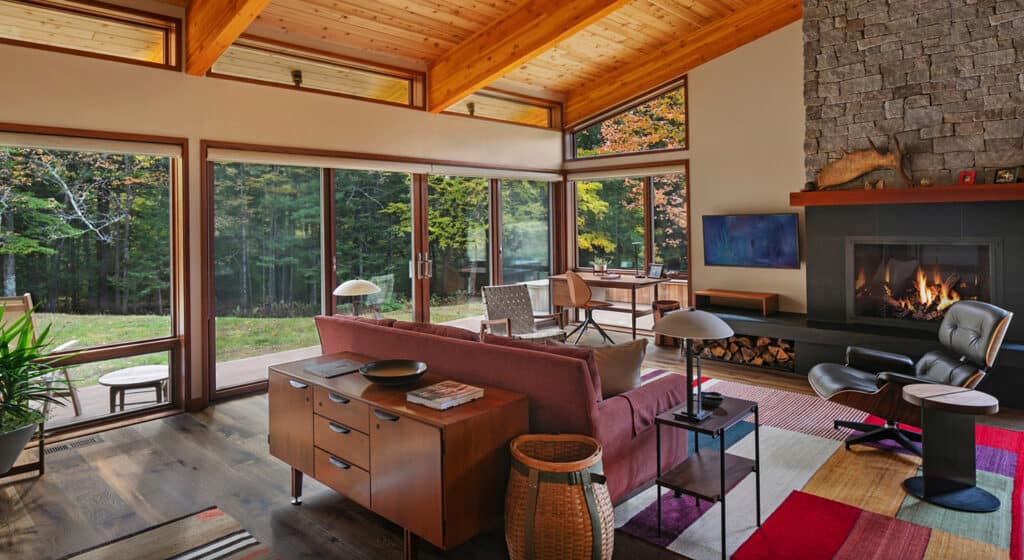 A beautiful midcentury deck house in New Hampshire invites nature inside