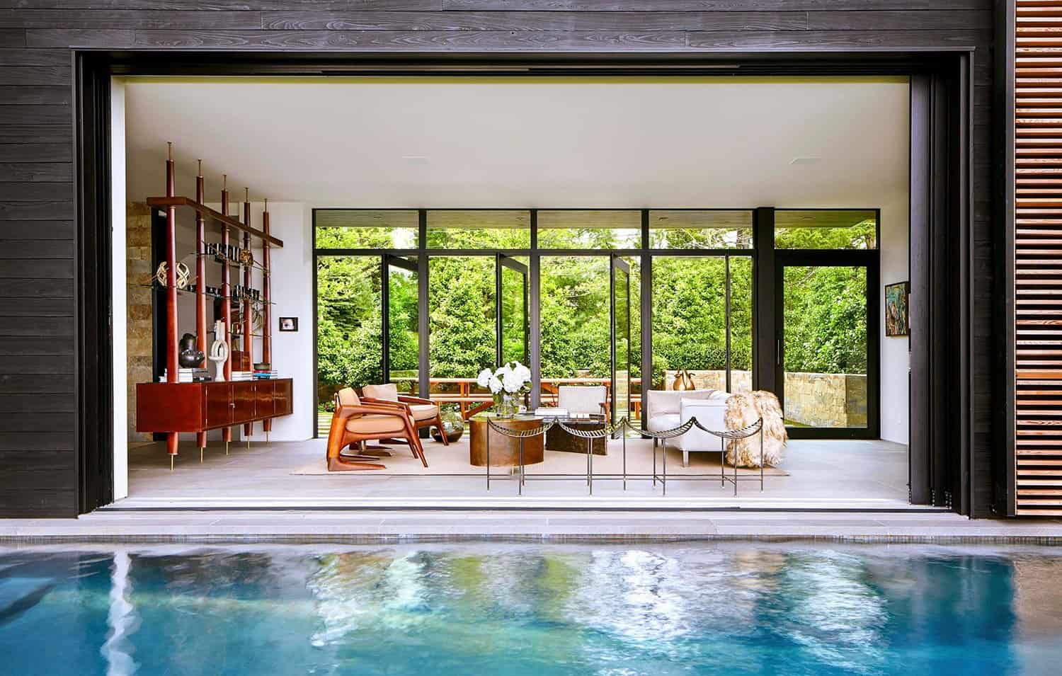 midcentury-home-exterior-with-a-swimming-pool