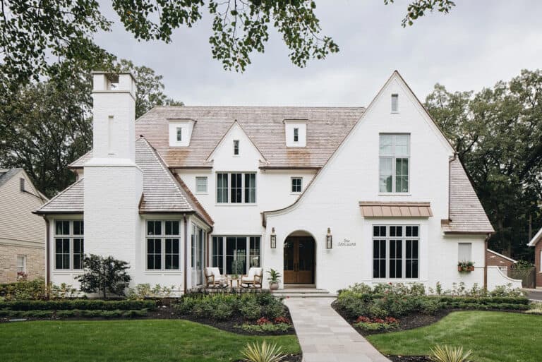 Tour this absolutely stunning and timeless white brick house in Illinois
