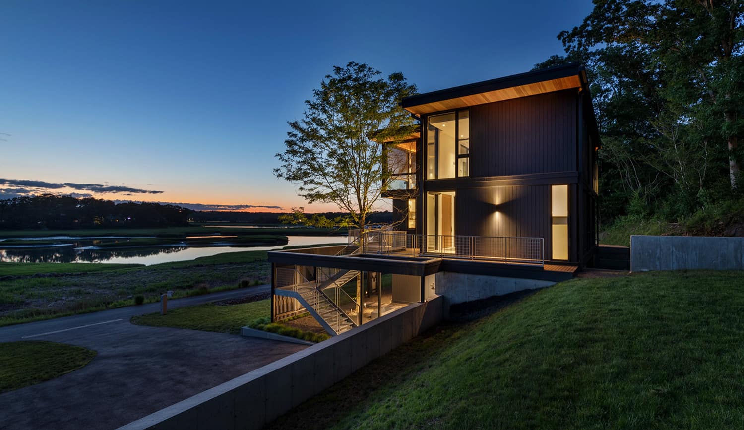 modern-river-house-exterior-dusk