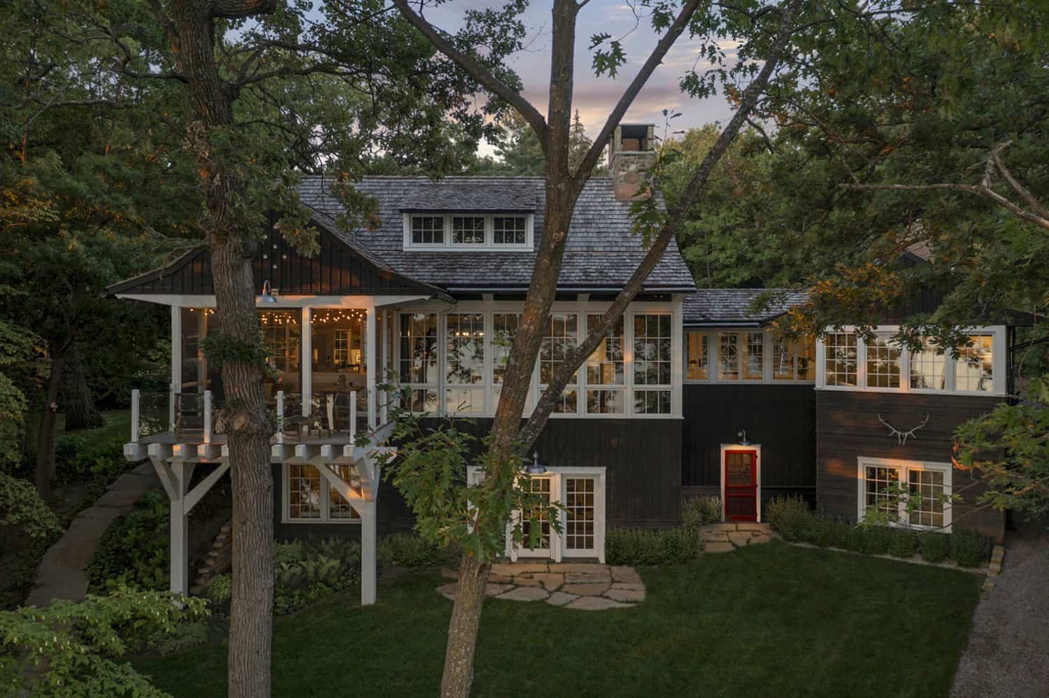 scandinavian-lake-cottage-exterior-dusk