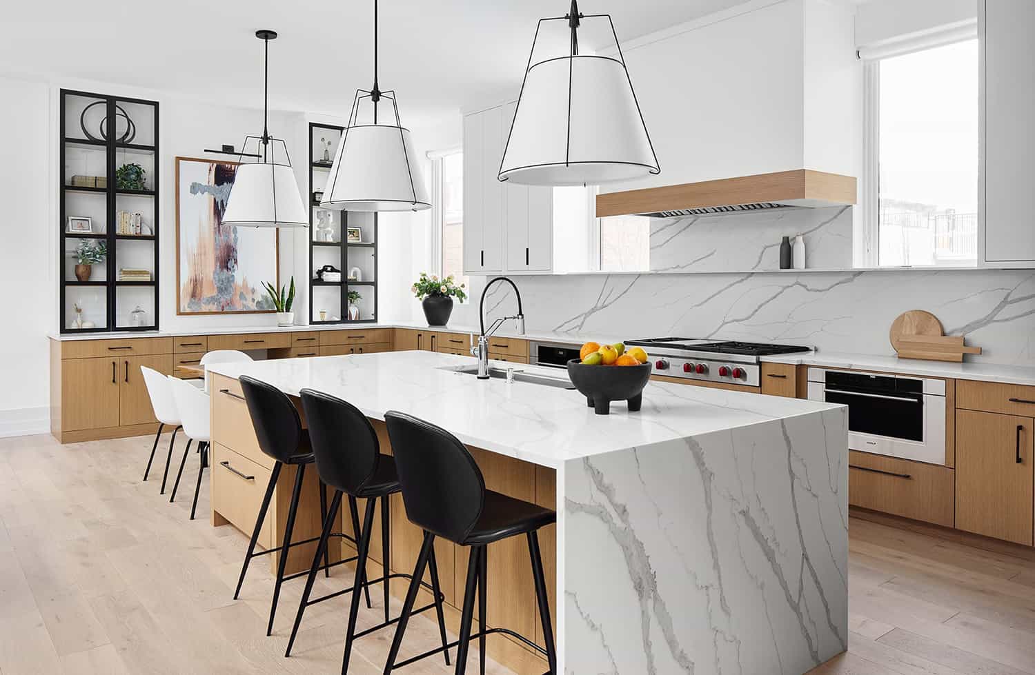 contemporary-kitchen-with-a-marble-waterfall-island