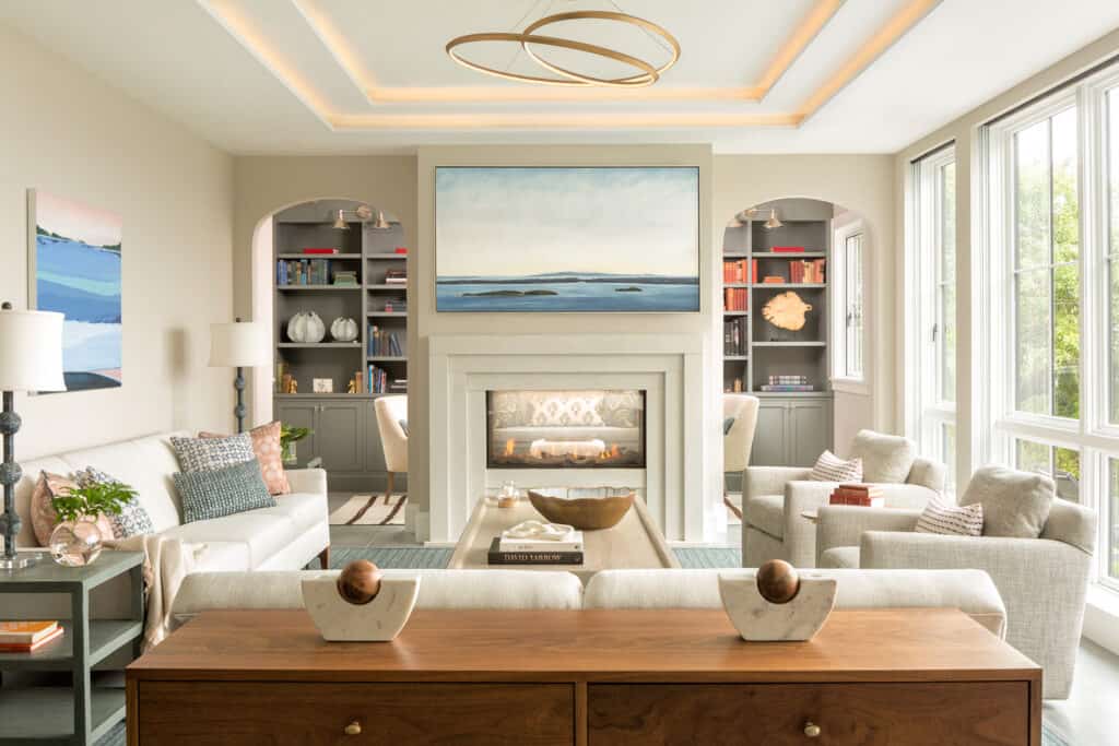 A modern shingle-style home rests peacefully on the Maine coast