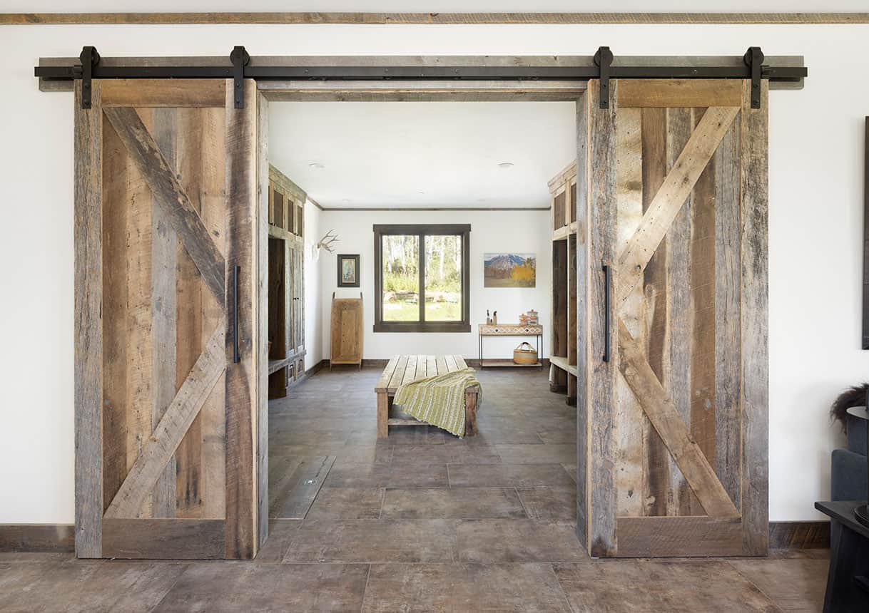 rustic-mudroom-with-sliding-barn-doors
