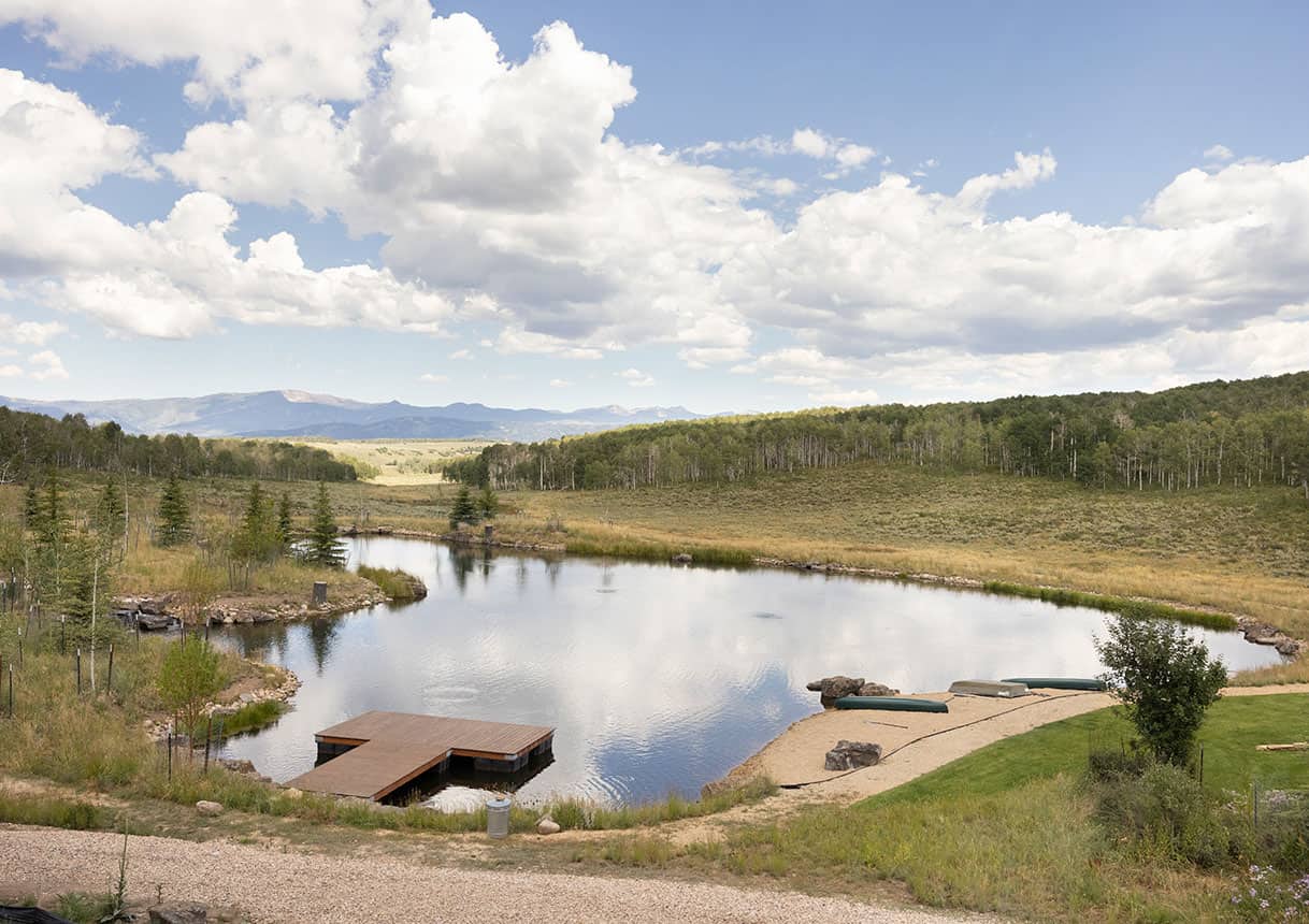rustic-home-landscape-with-a-pond