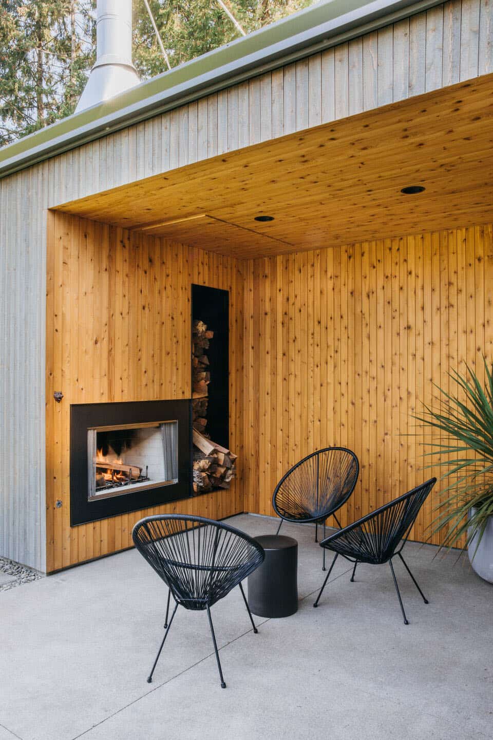 modern-scandinavian-home-covered-patio-with-a-fireplace