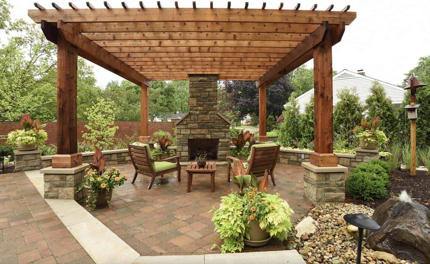 suburban-naturescape-backyard-pergola-design-with-a-fireplace