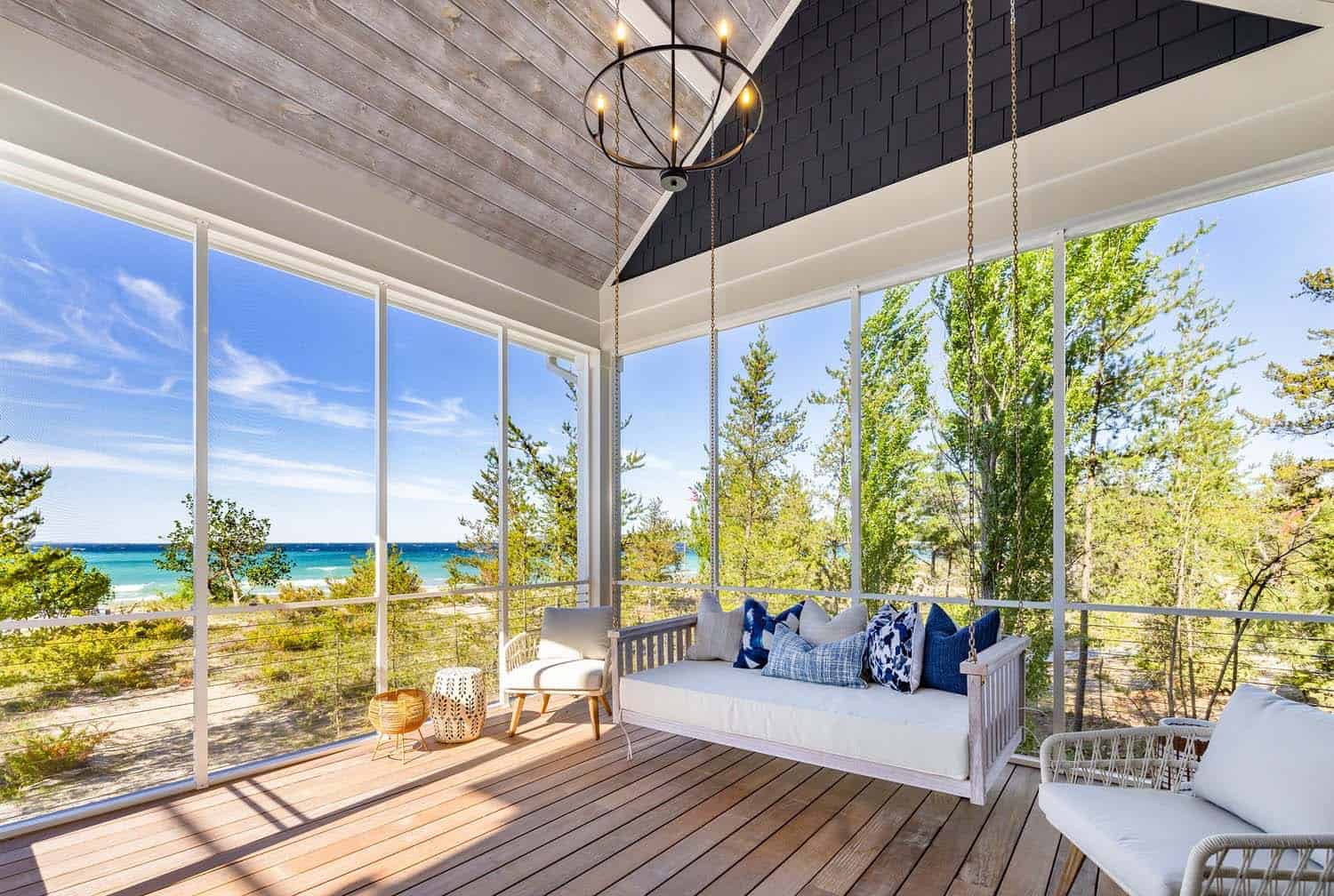 lake-house-patio-with-a-hanging-swing