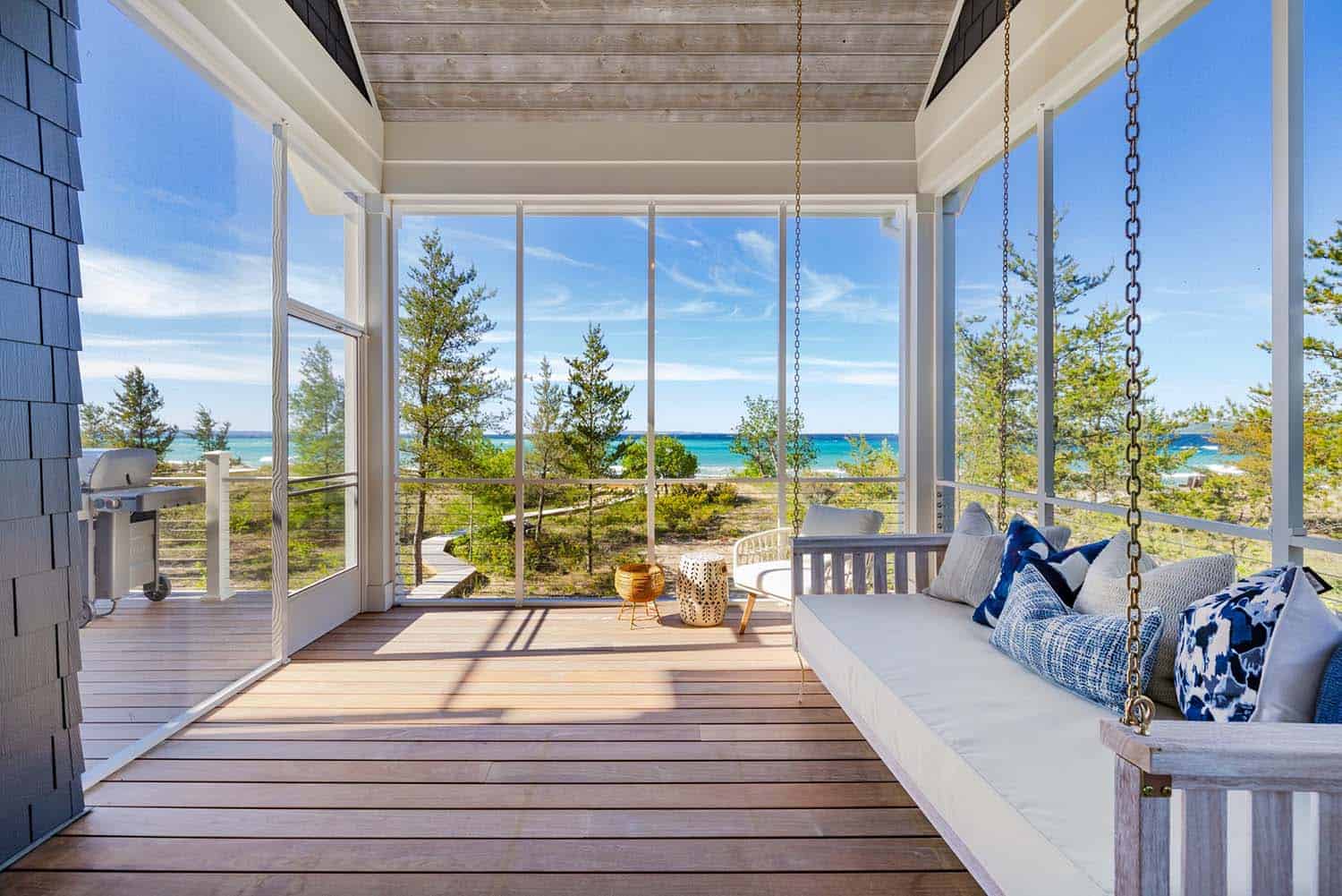 lake-house-patio-with-a-hanging-swing