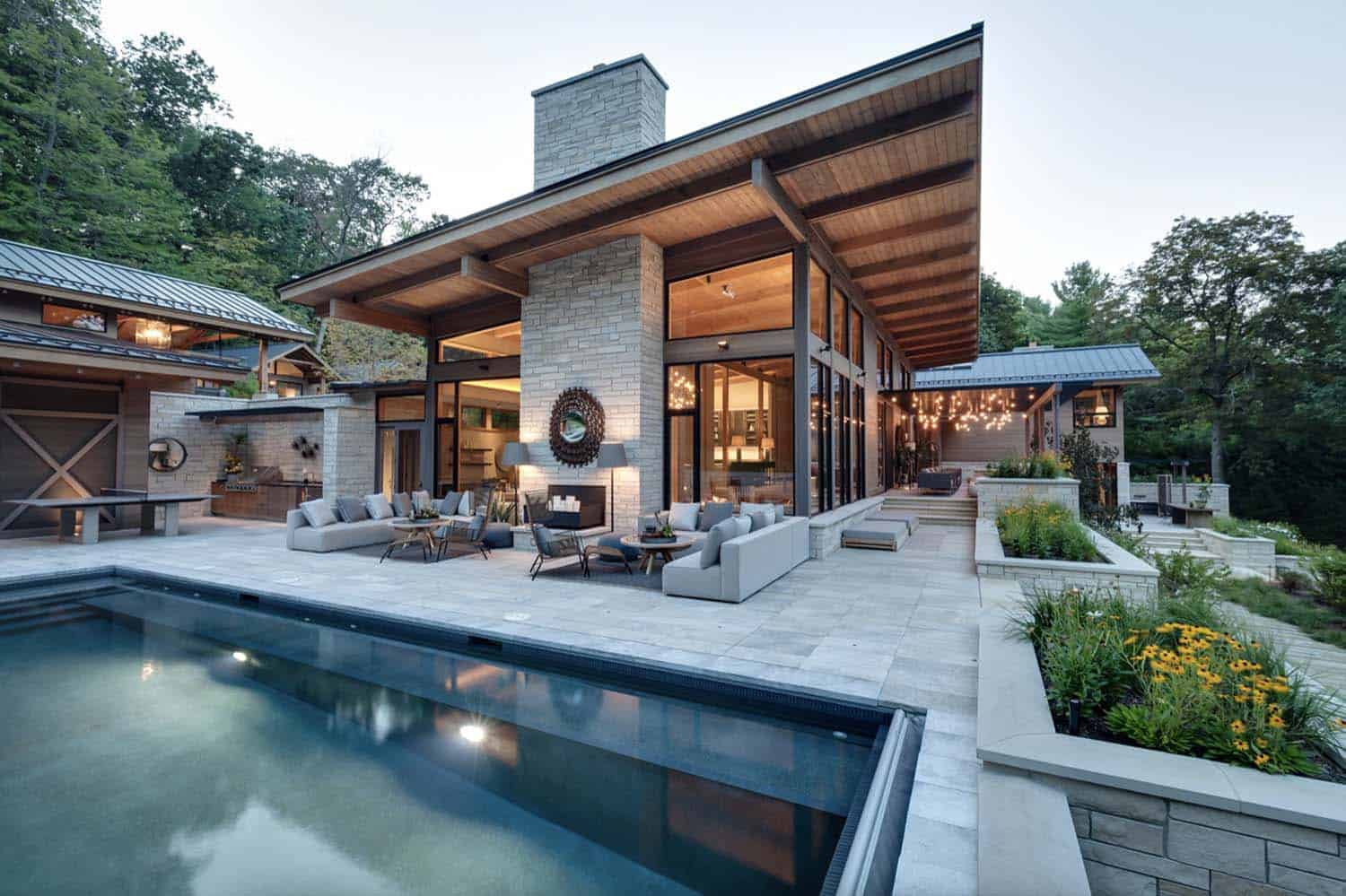 lakeside-resort-home-modern-exterior-outdoor-kitchen-and-spa