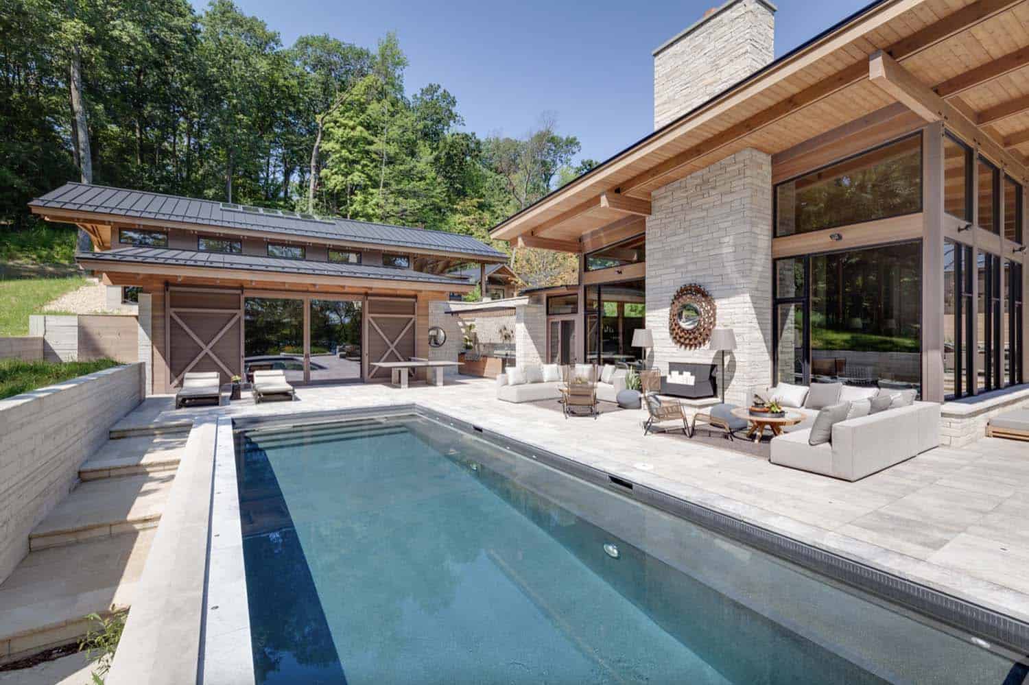 lakeside-resort-home-modern-exterior-pool-and-patio