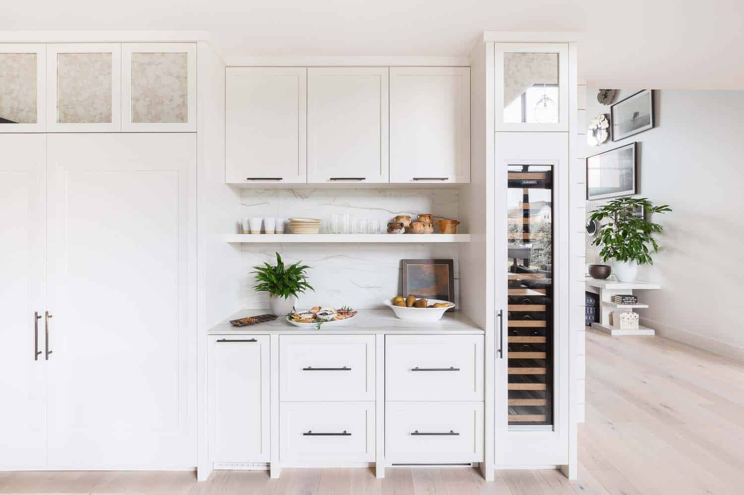 transitional style kitchen with storage cabinets and a wine chiller