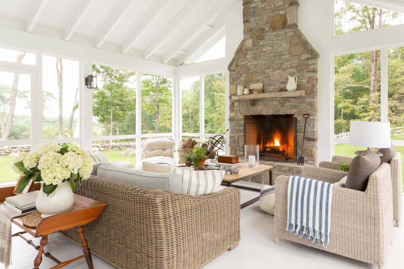 modern farmhouse sunroom with a fireplace