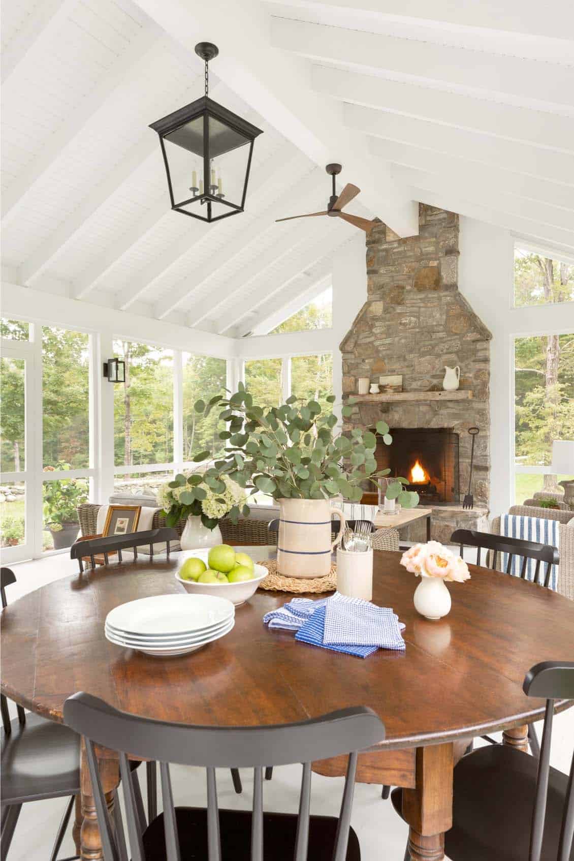 modern farmhouse sunroom with a fireplace