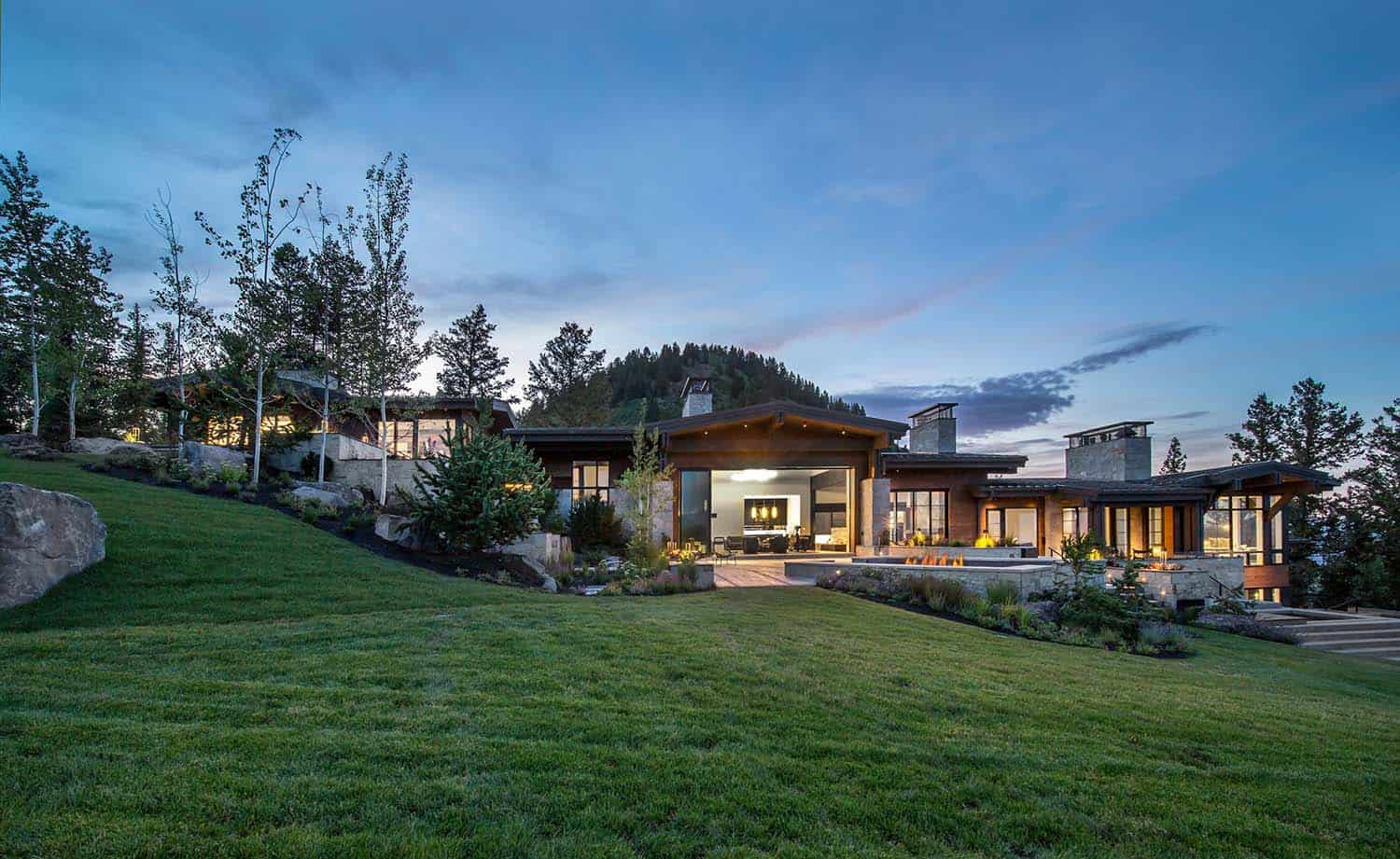 mountain home exterior at dusk