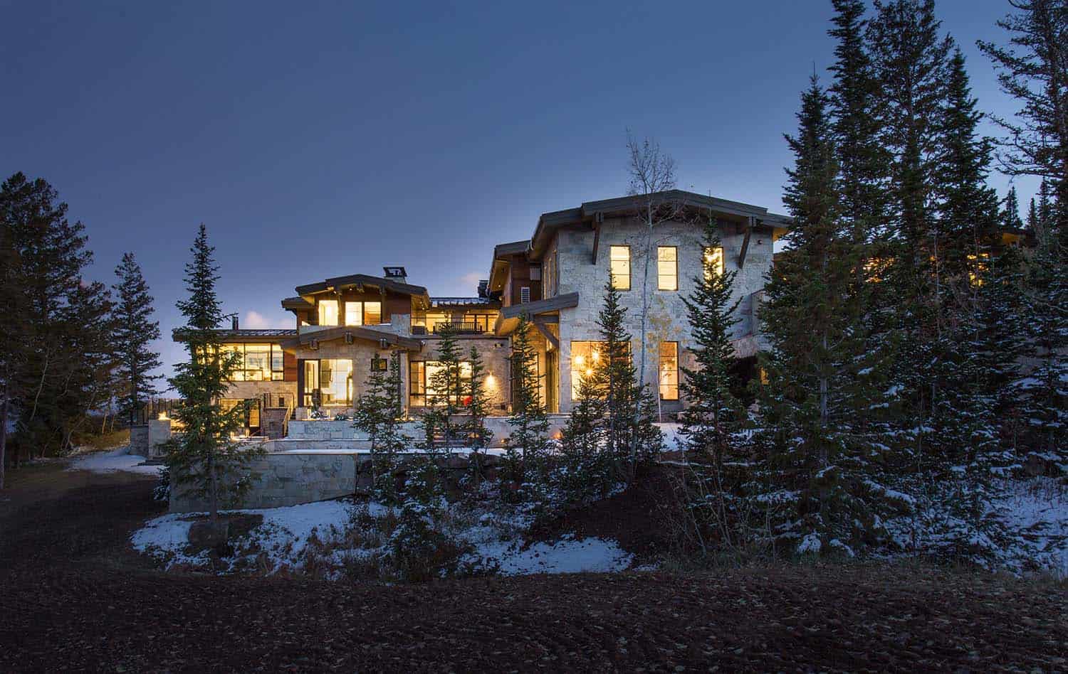 mountain home exterior at dusk