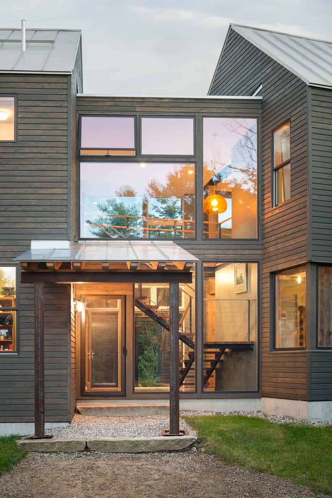 modern barn home exterior at dusk