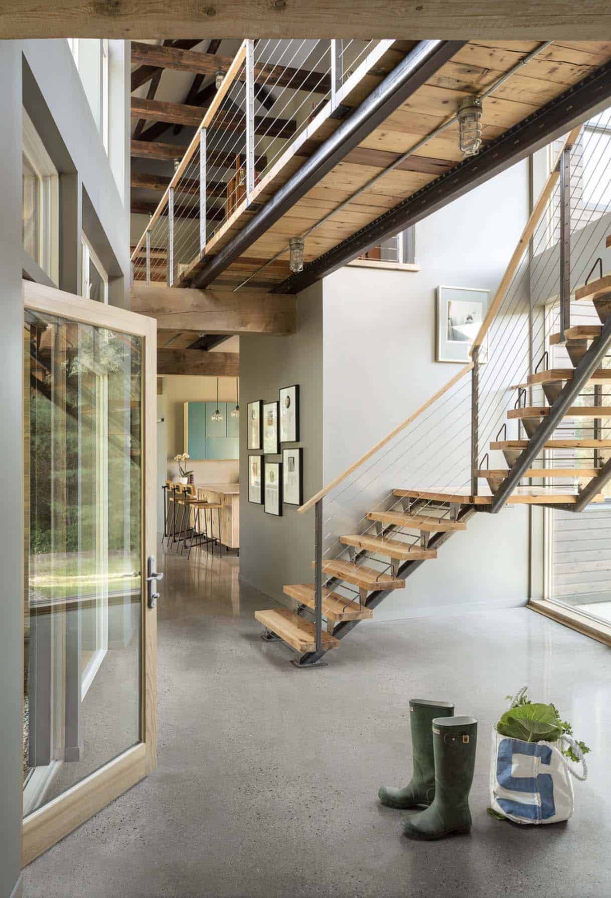 farmhouse entry with a two level staircase
