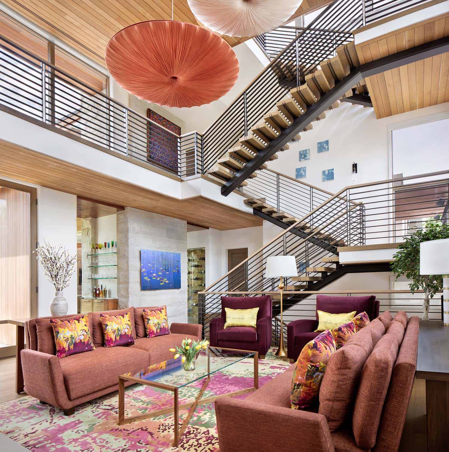 modern living room with a floating staircase