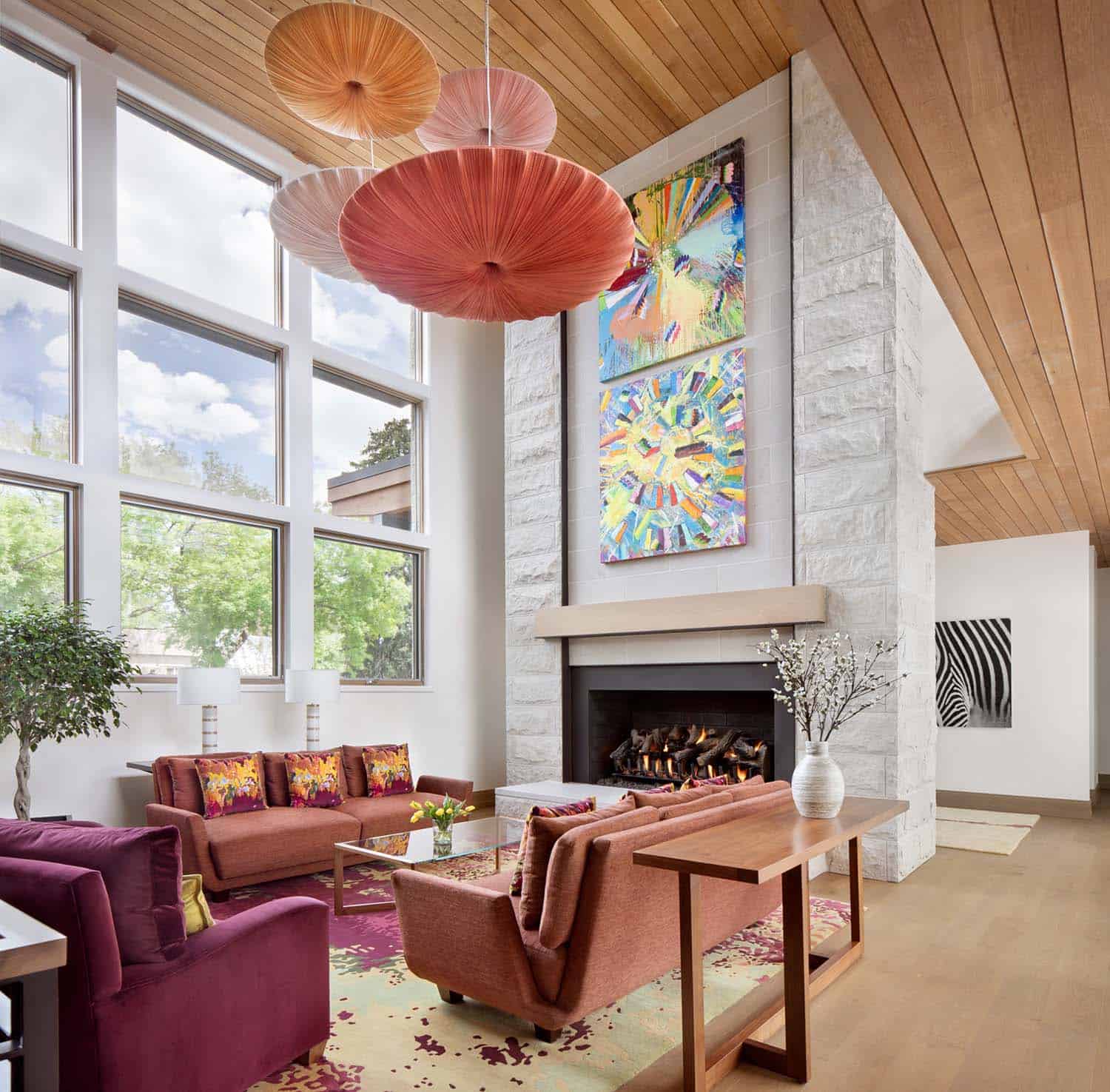 modern living room with a floor to ceiling fireplace