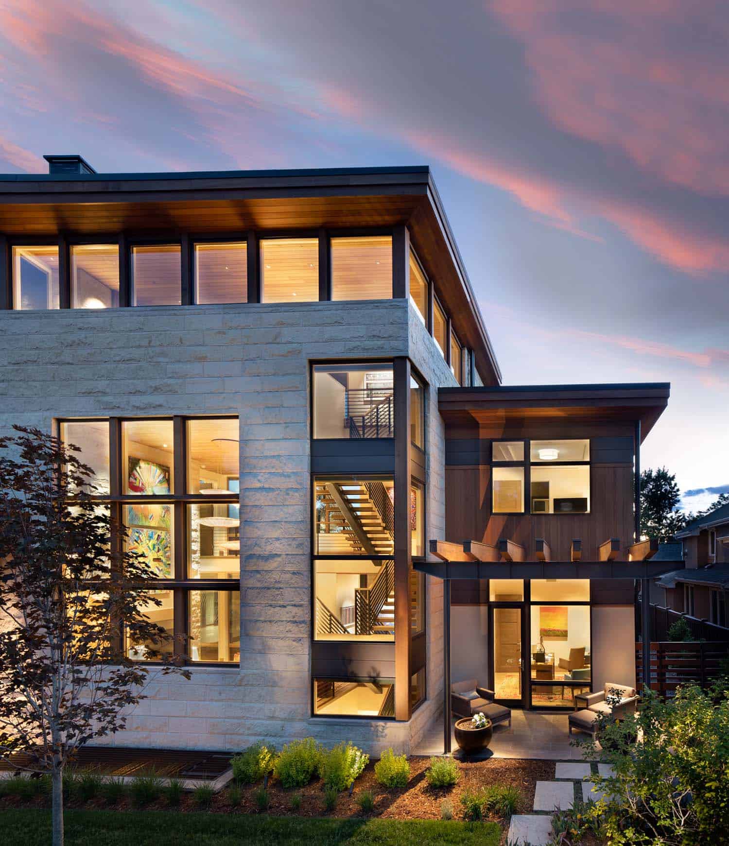 modern urban house exterior backyard at dusk
