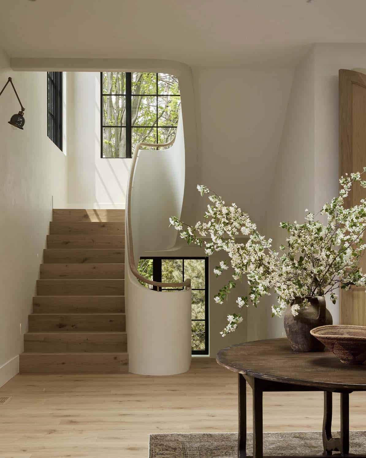 transitional style entry with a grand staircase