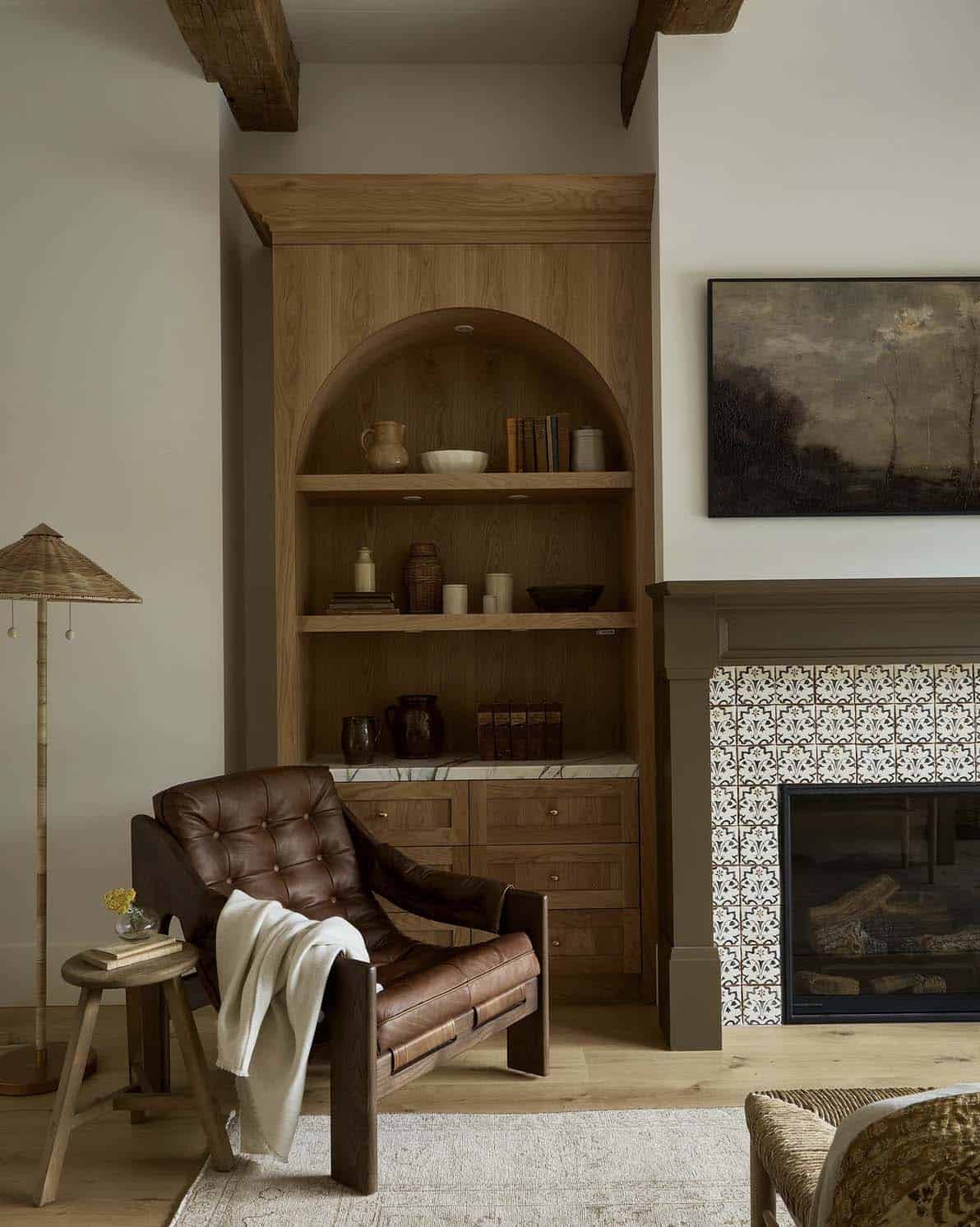 transitional style bedroom with a fireplace