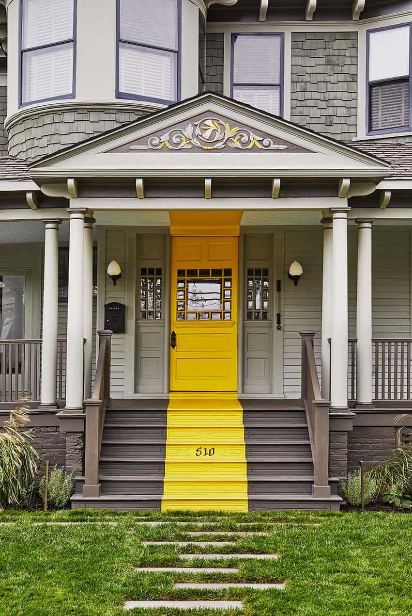 victorian-home-exterior-with-a-yellow-door