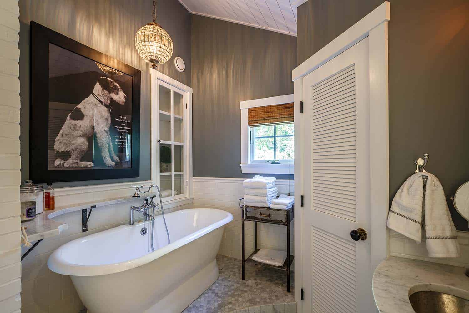 beach style bathroom with a soaking tub