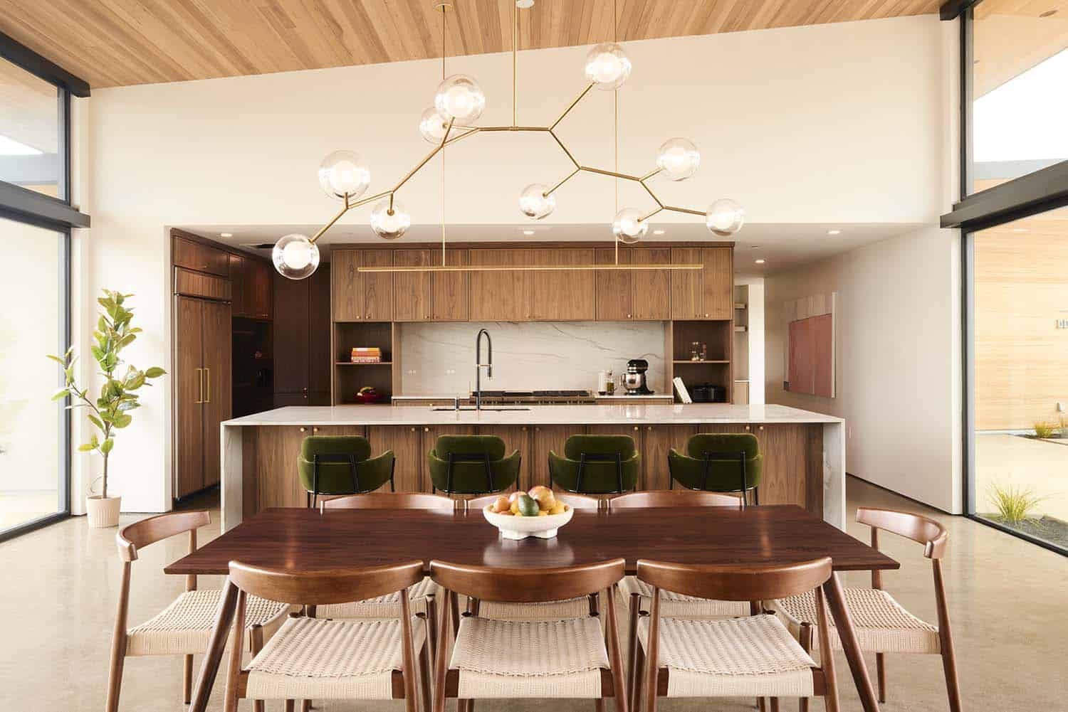 modern dining room with a large chandelier