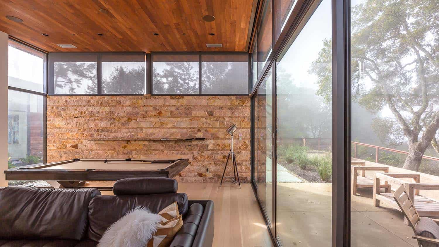 modern game room view of stone wall