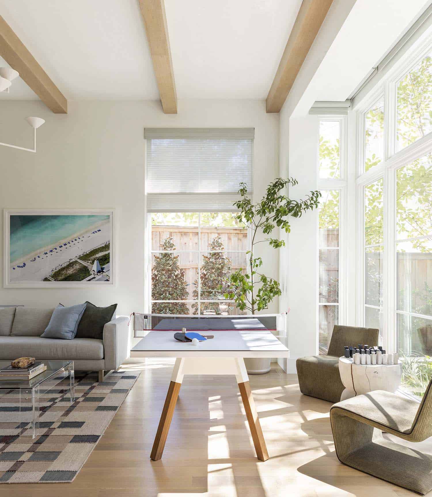 French provincial family room with a ping pong table