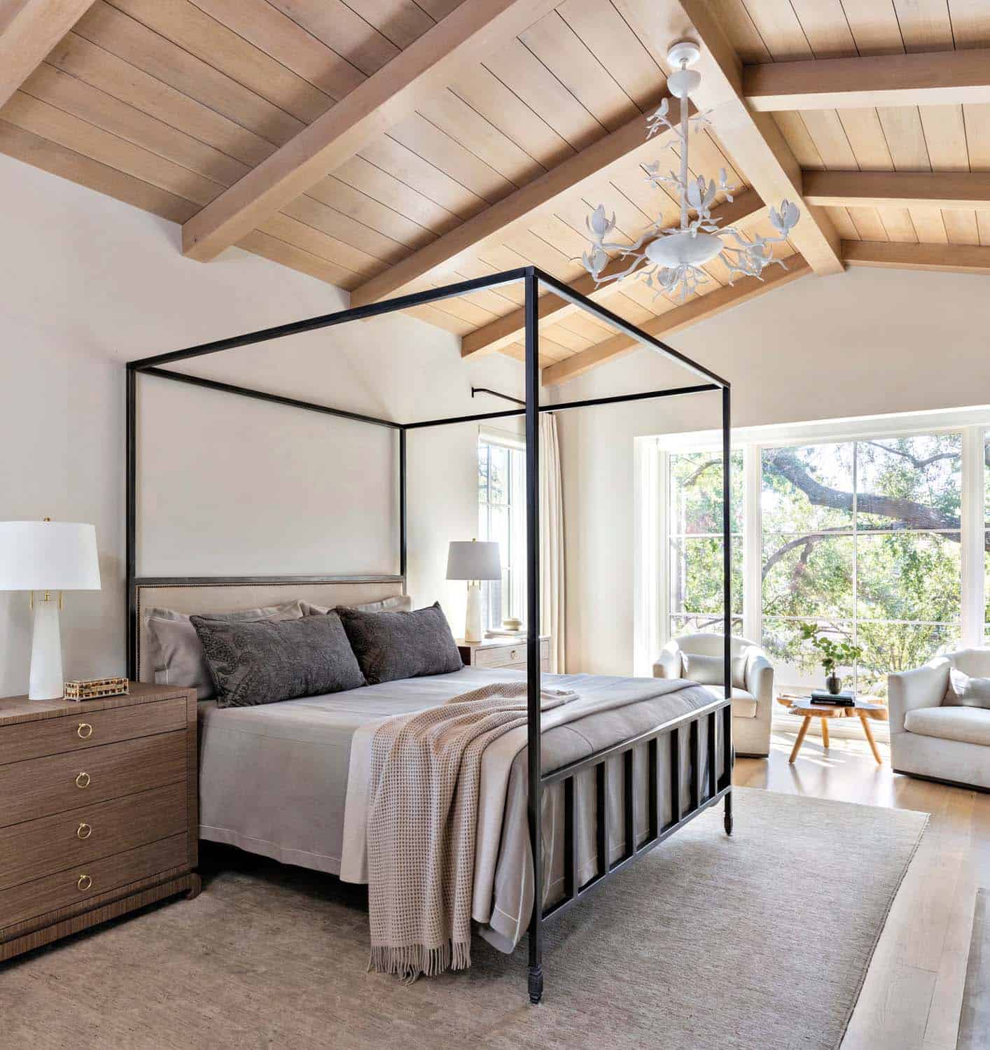 French provincial bedroom with a canopy bed